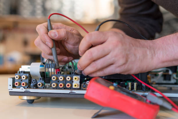 Technician fixing LED TV screen